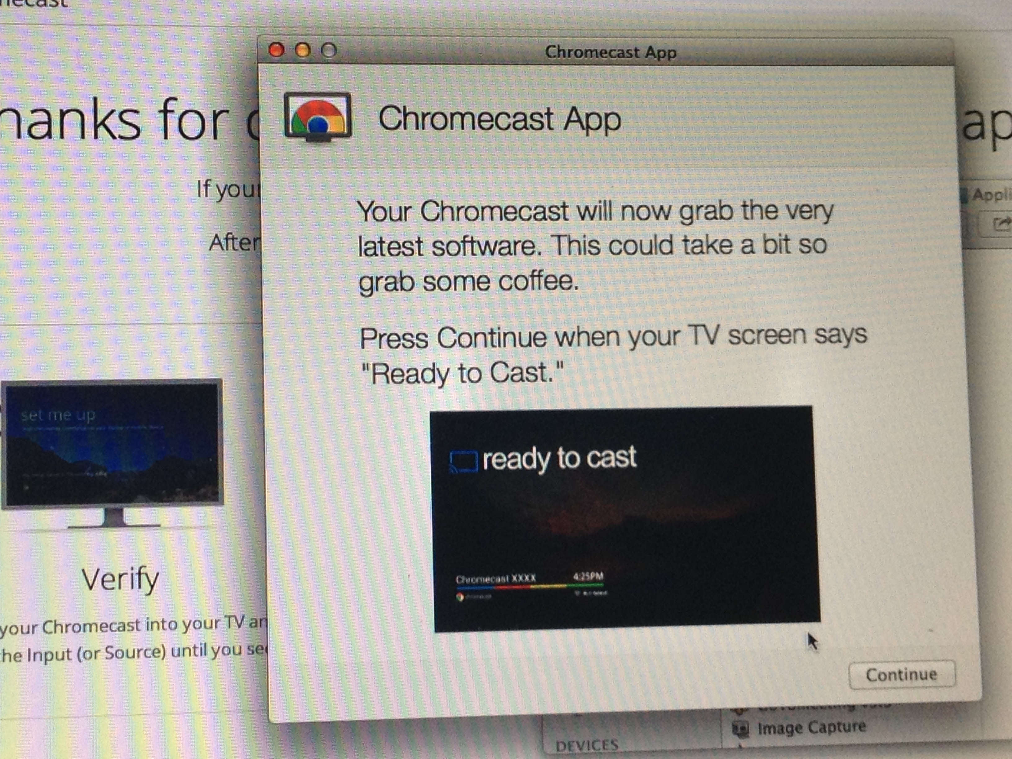 Screenshot of app explaining that the Chromecast is downloading updates